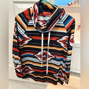 Ladies Aztec print. Size large. Unsure brand.